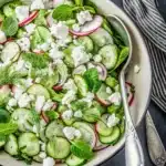 Fresh cucumber radish salad with goat cheese